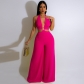 Solid color strapping neck wrap chest button wide leg jumpsuit QM4595